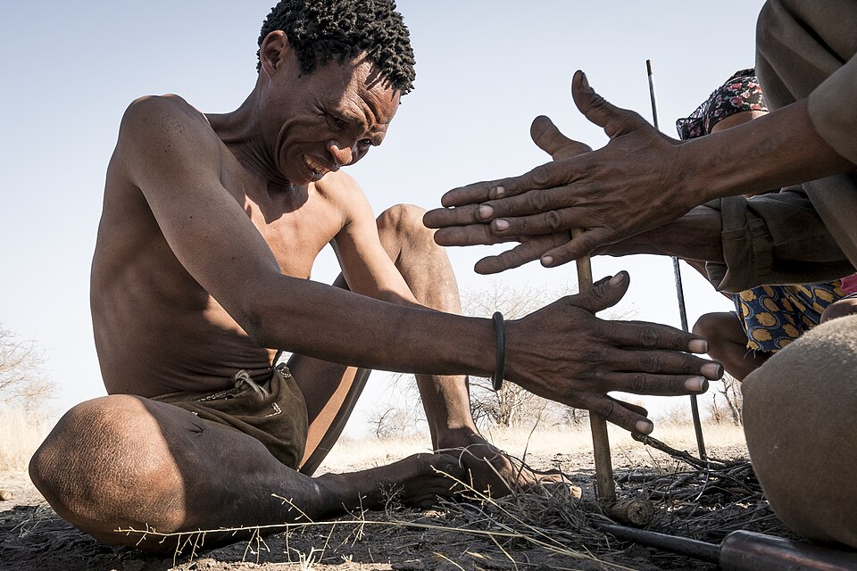 San Bushman Extracting Water Siphon